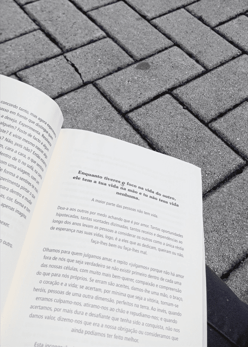 An open book being read outdoors